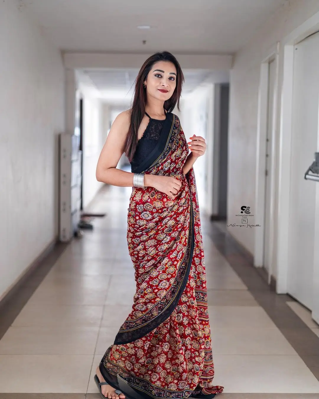 Bhanu Sri Wearing Maroon Saree Sleeveless Black Blouse